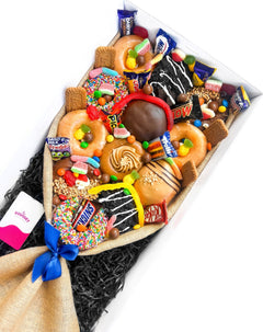 Angled view of our Large Men's Deluxe Donut Bouquet featuring a generous selection of donuts, chocolates and lollies, perfect for birthdays and gifts for him.
