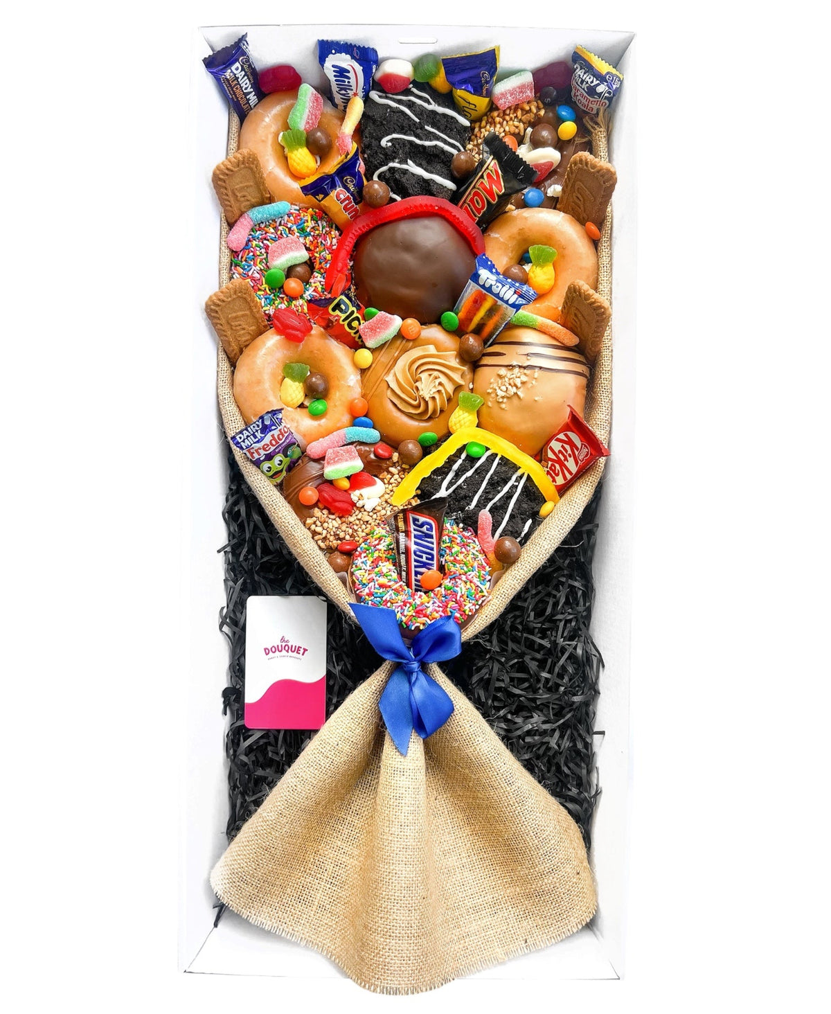 Large Men's Deluxe Donut Bouquet packed with assorted donuts, chocolates, and colourful lollies, finished with a blue ribbon.