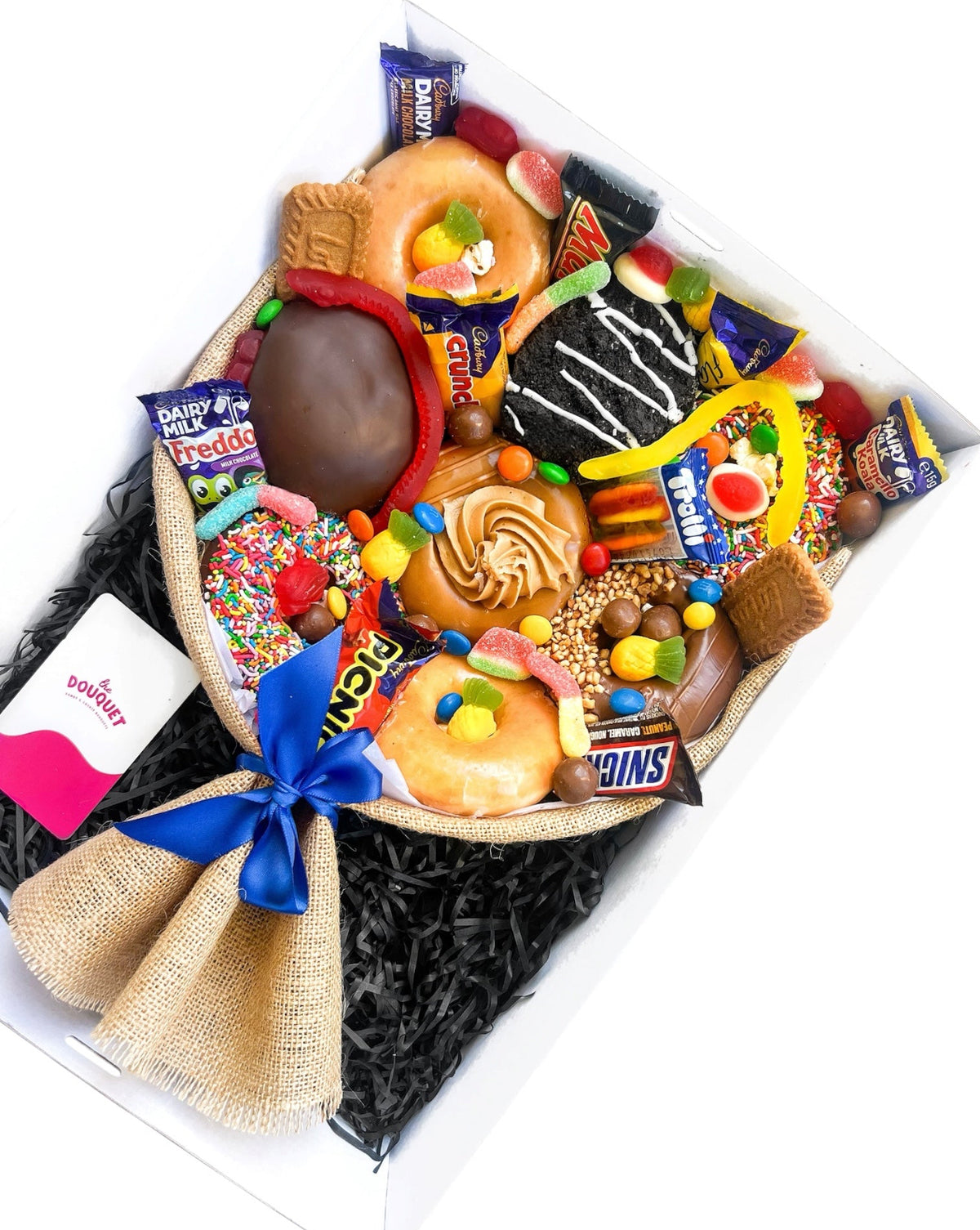 Angled view of our Medium Men's Deluxe Donut Bouquet packed with sweet treats, chocolates and lollies, available for delivery across Perth.